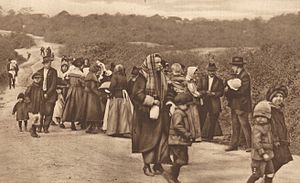 Residents of South Amboy  leave the city on foot as fires and explosions rock the Gillespie shell-loading plant.